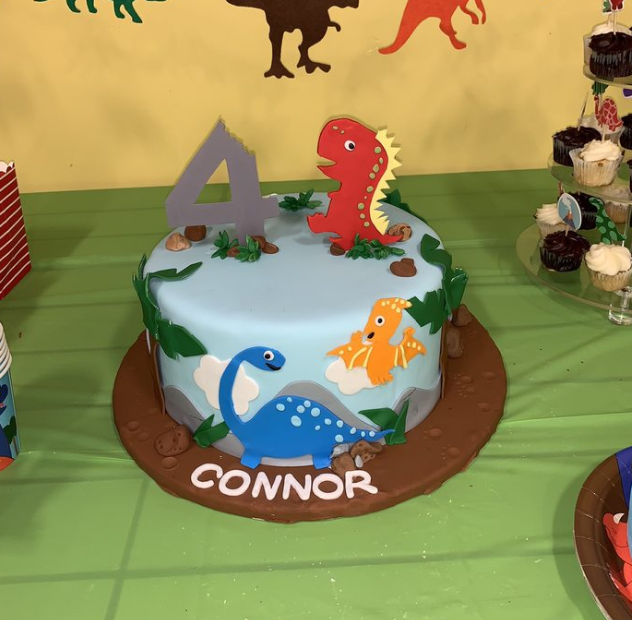 custom dinosaur-themed cake for lake forest costumer